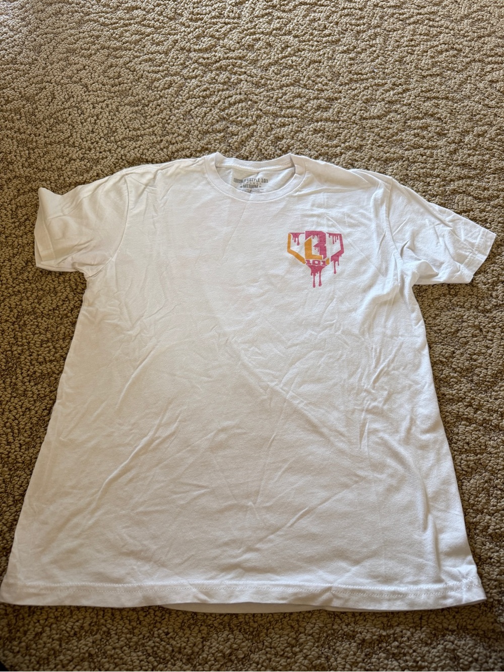 White Short-Sleeve Graphic Tee with Pink and Yellow Chest Print